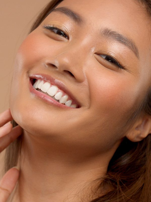 closeup portrait o asian thai japanese model happy laughing